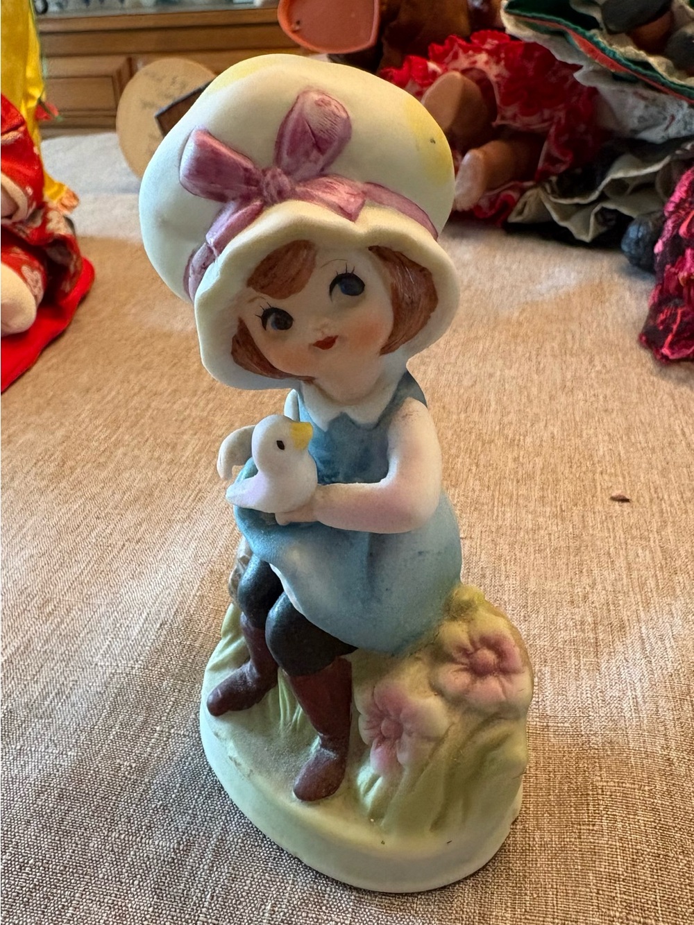 Vintage Blue and Cream Girl Figurine with Bird - Decorative Home Accent